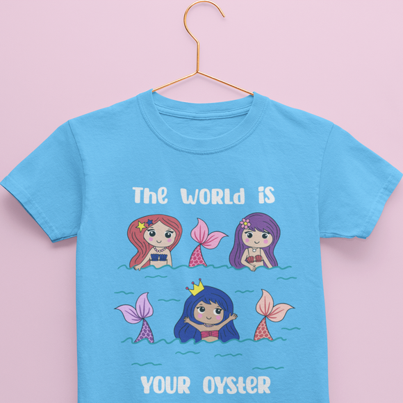 Light Blue Kids Cotton Tshirt from Kidswear Brand - Cute and Cool with print that has mermaids and quote that says The World Is Your Oyster